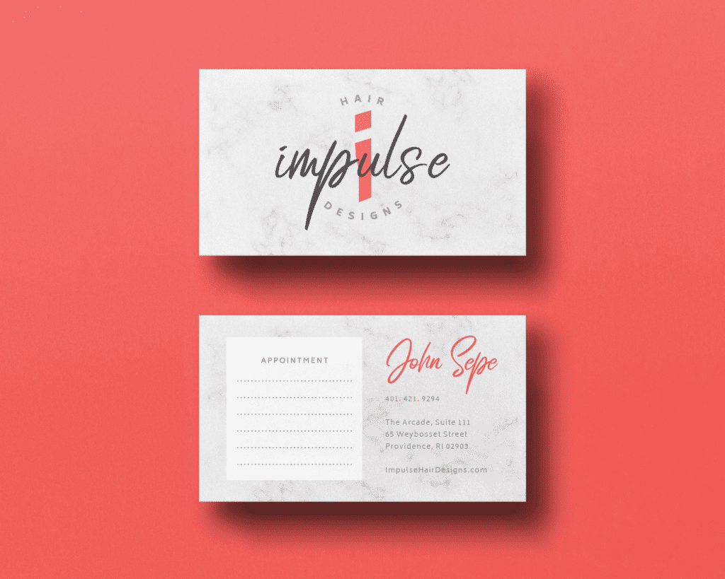 Impulse Hair Designs business card design featuring custom logo, contact info, and appointment area on marble and coral background.